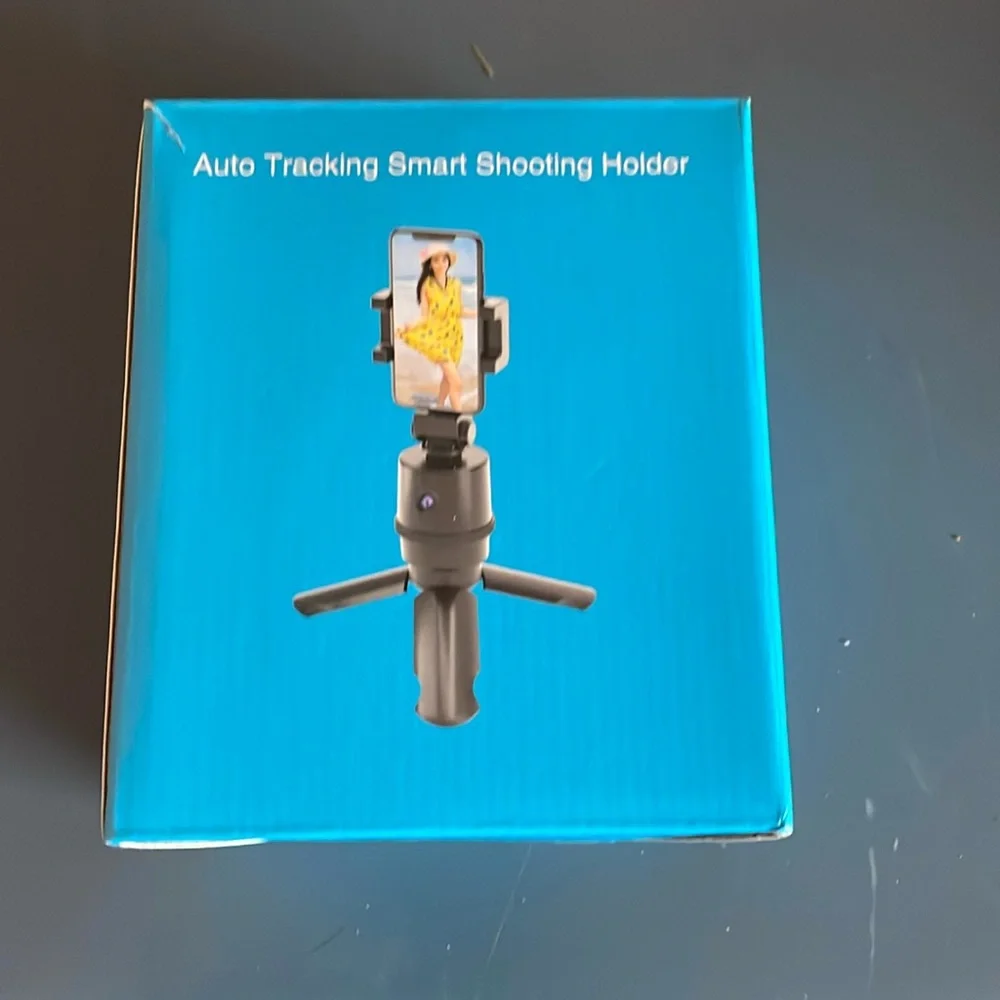 Photo tracking phone holder